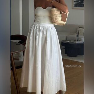 SHOWPO. midi length white skirt